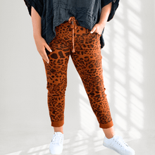 Load image into Gallery viewer, Animal Stretch Pants in Rust by The Inspired Wardrobe Australia